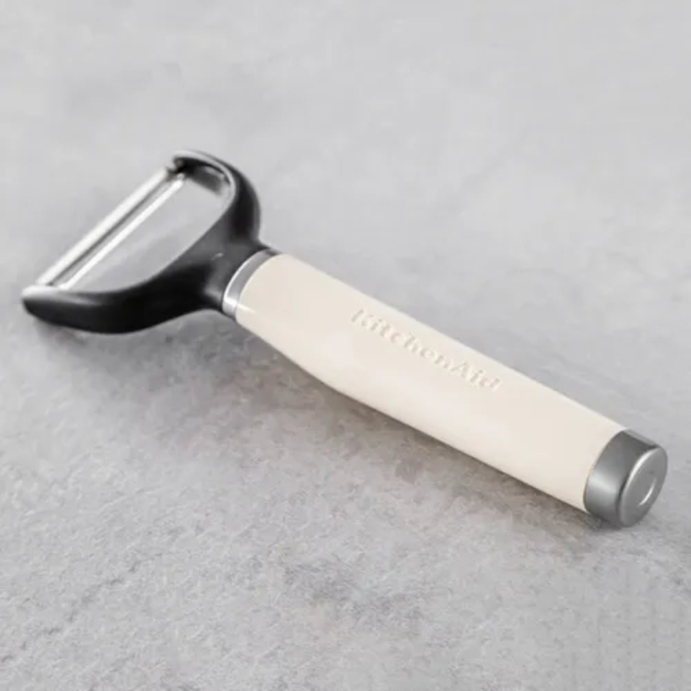 KitchenAid Pelador en Y de Acero Inoxidable Color Crema