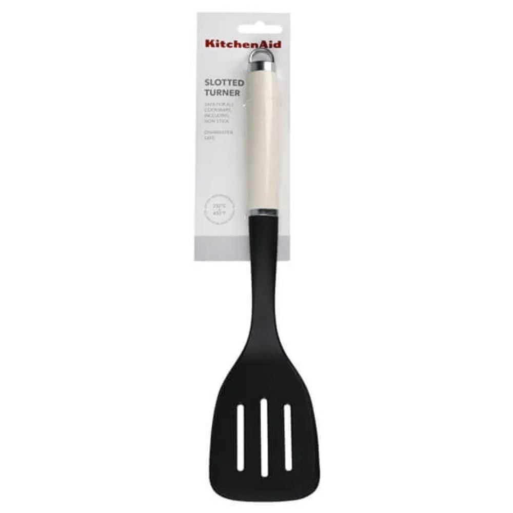 KitchenAid Espatula Ranurada Antiadherente Con Argolla Crema