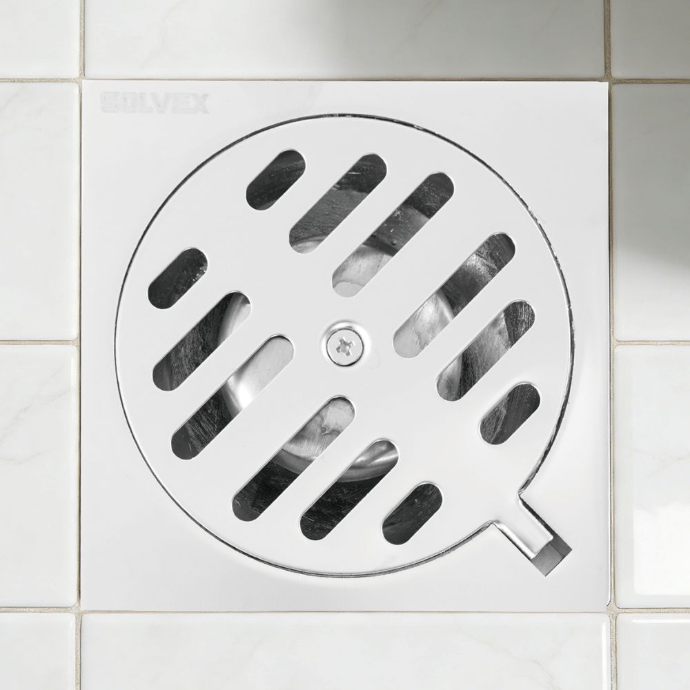 Solvex Smart Desagüe Cromado Para Piso En Zinc Antiolor Rejilla Redonda Sobre Base Cuadrada De 4"